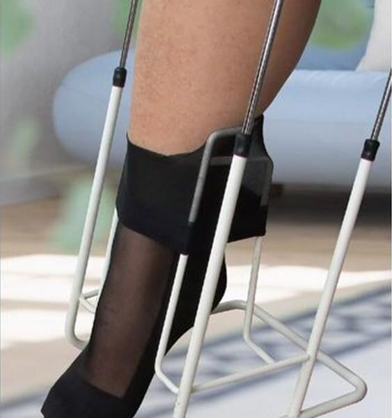 Instrument for putting on compression stockings and tights